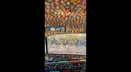 Chinese taxi decorated with thousands of cartoon stickers