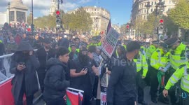 Pro-Palestine protesters scuffle with police during huge March for Palestine
