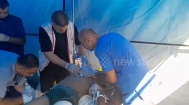 Injured Palestinian treated after Israel hits house in Gaza refugee camp