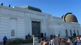 Thousands gather to watch solar eclipse from Griffith observatory in Los Angeles
