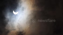Solar Eclipse with clouds over Corpus Christi, Texas on October 14, 2023 before totality