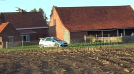 Rally car goes into ditch , spectators take him out. Rally crash Belgium