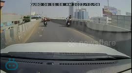 Out-of-control biker almost crashes off overpass in western India