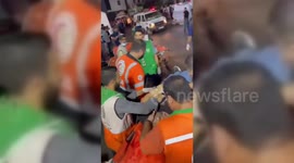 Paramedics evacuate injured Palestinian in Gaza, Palestine