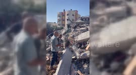 Palestinians search rubble for survivors following airstrikes in Gaza