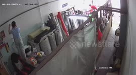 Plug bursts into flames when woman tries to turn on light