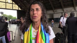 interview with woman on disembarkation of Brazilian repatriates at the Sao Paulo Air Base, Brazil