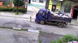 Chinese toddler miraculously survives after being hit by sanitation truck