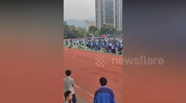 Track and feathers! Live emu joins school sports day running race