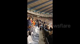 Fans at Belgium-Sweden game chant together after 2 Swedes killed in Brussels