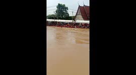 Spectators scream as boat sinks plunging rowers into fast-flowing river in Thailand