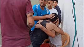 Injured carried into hospital after deadly Israeli strike on Rafah