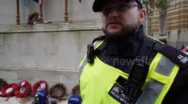 Police officers confronted for leaving riot gear on the Cenotaph
