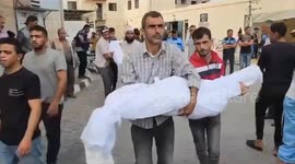 Bodies removed by pickup truck from Gaza hospital hit in blast