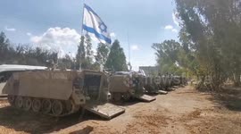 Israeli tanks and trucks in the border area with Gaza