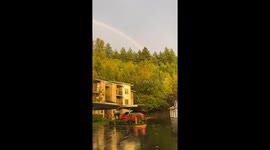 Rainbow graces Auburn skyline
