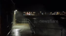 Waves crash over seawall in St Ives as Storm Babet makes landfall