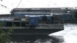 File Footage of boats sailing on the river as Congo boat tragedy death toll climbs to 52, dozens still missing in Kinshasa