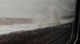 Disruptions as waves whipped up by Storm Babet crash onto train tracks