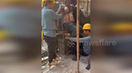 Construction worker survives after being impaled on five steel bars in China