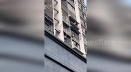 Hero neighbour saves girl hanging from balcony by her neck
