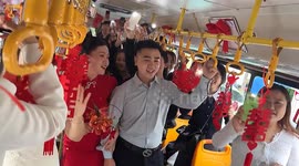 Newlyweds in China turn heads with public bus as unique wedding carriage