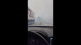 Wildfire Smoke Suddenly Lower Visibility on Road