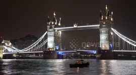 Tower Bridge engineers prepare to replace critical components on rainy night in London, UK