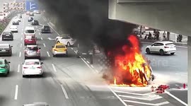 BMW engulfed in flames claims life of driver after collision with taxi in China