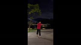 Youngster practices his martial arts moves with a staff in China