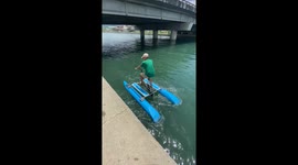 Filipino inventor builds 'water bike' for tourists to enjoy sea views (vertical)