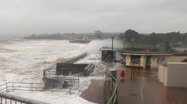 Storm Babet brings strong ocean waves and high winds to Devon, causing damage to beach huts