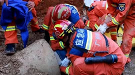 Firefighters rescue elderly man trapped in deep sewer in China