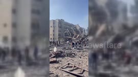 Israeli airstrikes destroy four buildings in Al-Zahra City in the Gaza Strip