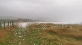 That's not snow! Seafoam turns Scottish field white as Storm Babet hits