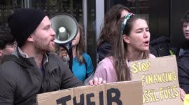 Greta Thunberg chants at climate protest outside major banks in London, UK
