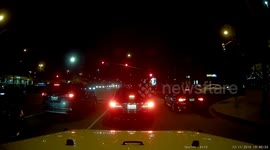 Car Drives Along Parking Lane into Parked Cars