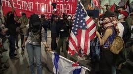 Brazilian protesters burn US and Israel flags during protest in support of Palestine