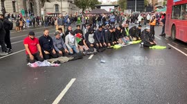 Protesters hold a prayer in Whitehall during massive pro-Palestine protest