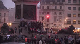 Palestine supporters launch fireworks in Trafalgar Square after march through London