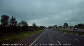 HGV in the central reservation on the M61 heading south near Chorley