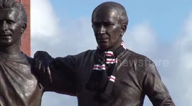 Fans pay respects to Sir Bobby Charlton at Old Trafford in Manchester, UK