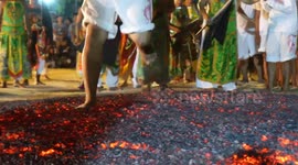 Taoist followers walk over hot coals in show of religious devotion