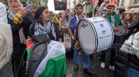 Pro-Palestinian protesters chant in Arabic at a mass demo in London against Israeli strikes on Gaza
