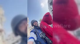 Palestinian Journalist Rescues Someone's Teddy Bear in Gaza Strip