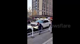 Road rage horror as security guard gets run over in parking dispute in China