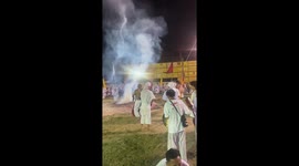 Devotees walk over hot coals at Vegetarian Festival in Phuket