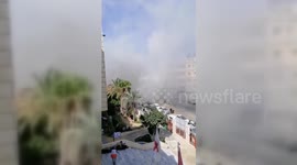 Locals flee as blasts go off near hospital in Gaza's Khan Yunis
