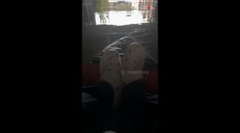 Woman forced to sail her way back home on a kayak because of severe flooding