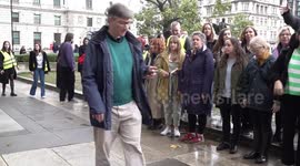 People mourn the children killed in Gaza during vigil in central London, UK
